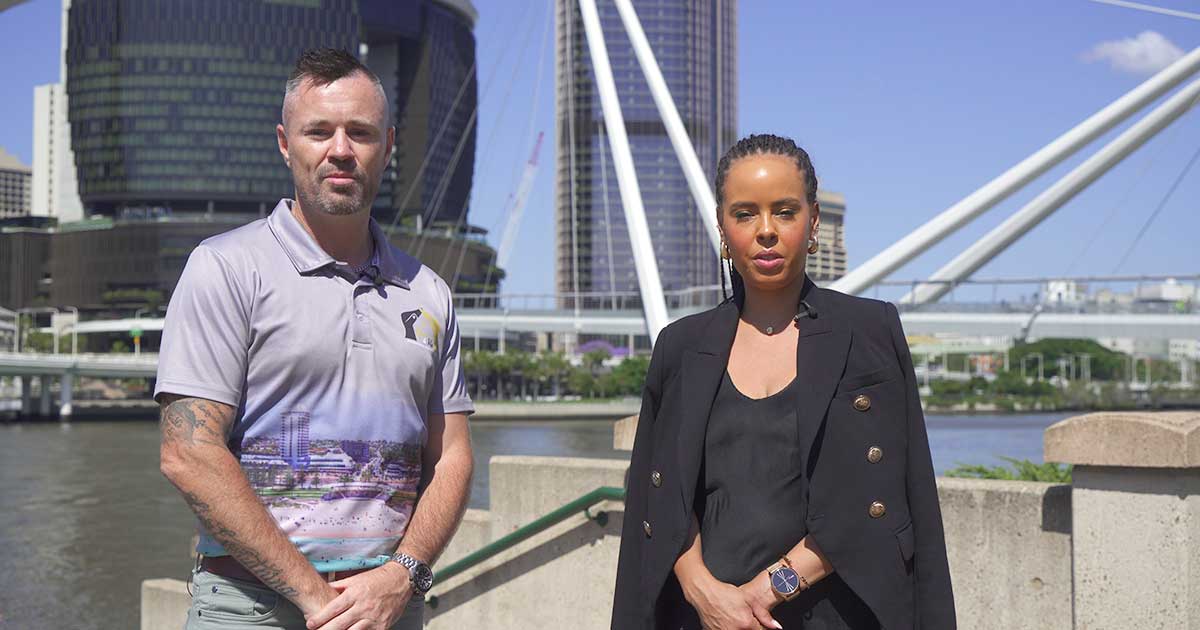 Heath Bassett and Tiff Collins standing at the front of the Brisbane Casino